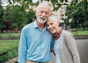 Photo of a laughing couple in a park. Link to Life Stage Gift Planner Ages 60-70 Situations. lsgp_60-70.jpg